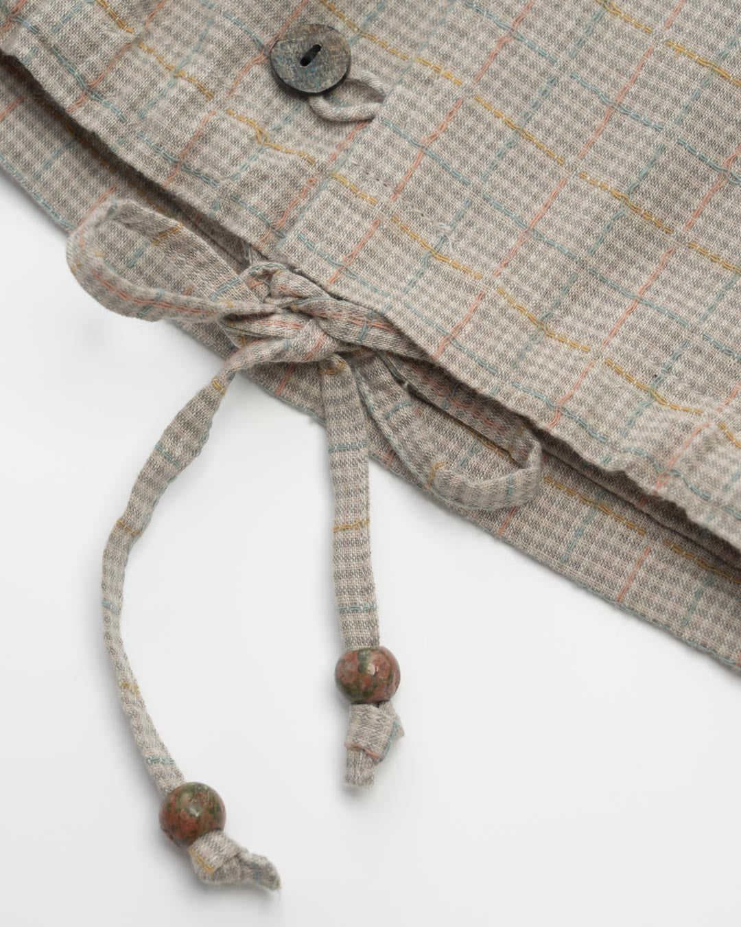 COLLARLESS PATCHWORK VEST