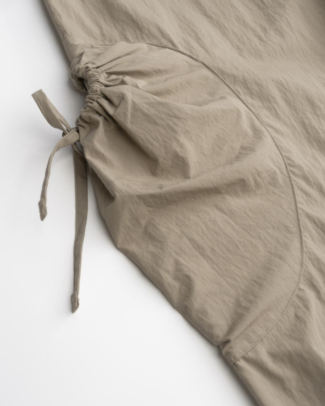 DRAWSTRING POCKET OVER PANTS