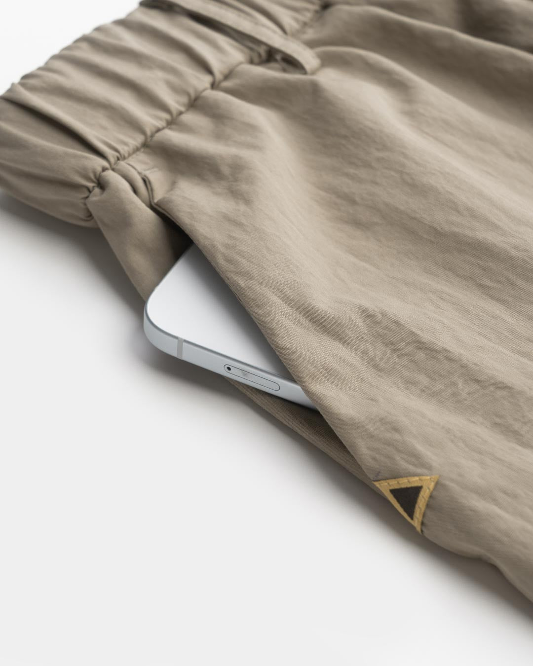 DRAWSTRING POCKET OVER PANTS