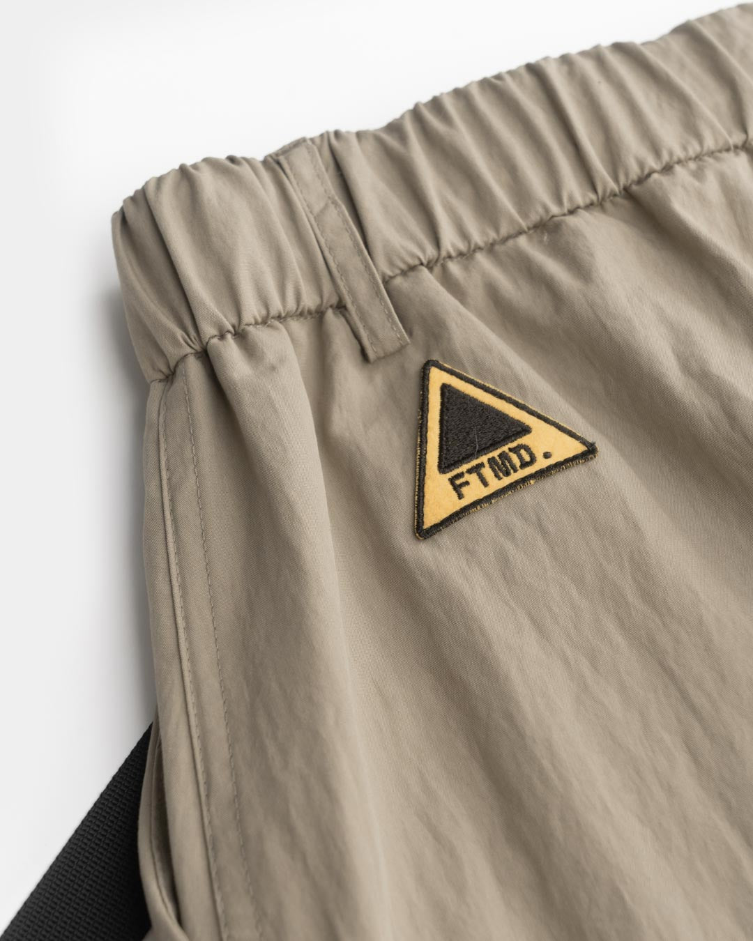DRAWSTRING POCKET OVER PANTS