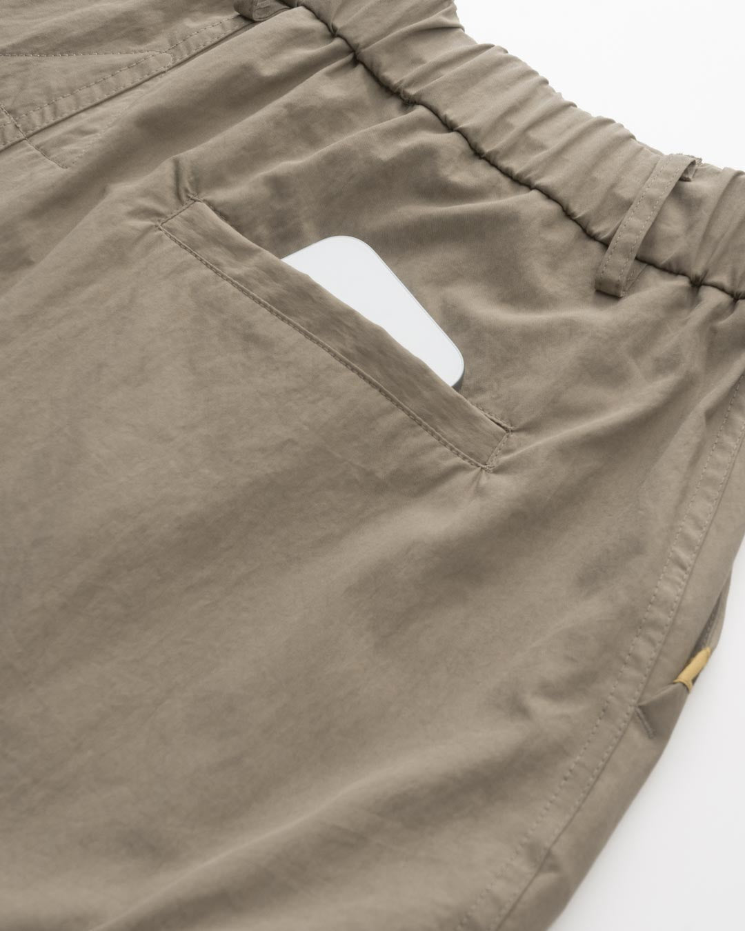 DRAWSTRING POCKET OVER PANTS