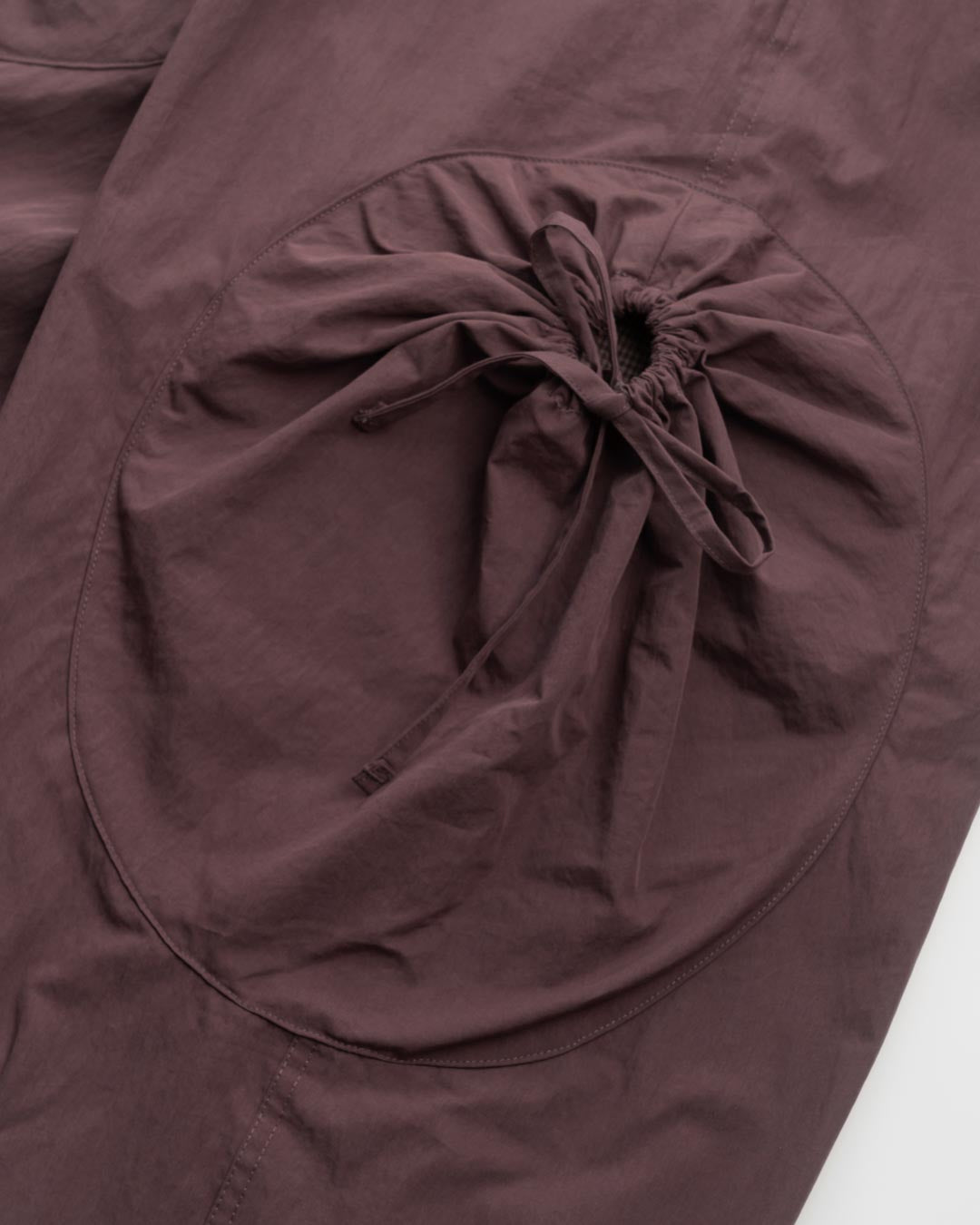 DRAWSTRING POCKET OVER PANTS
