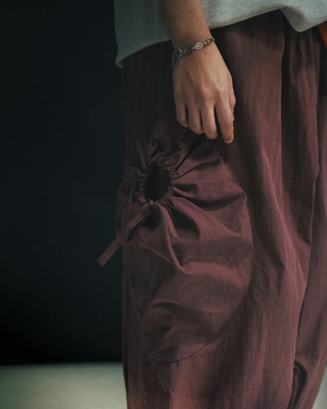 DRAWSTRING POCKET OVER PANTS