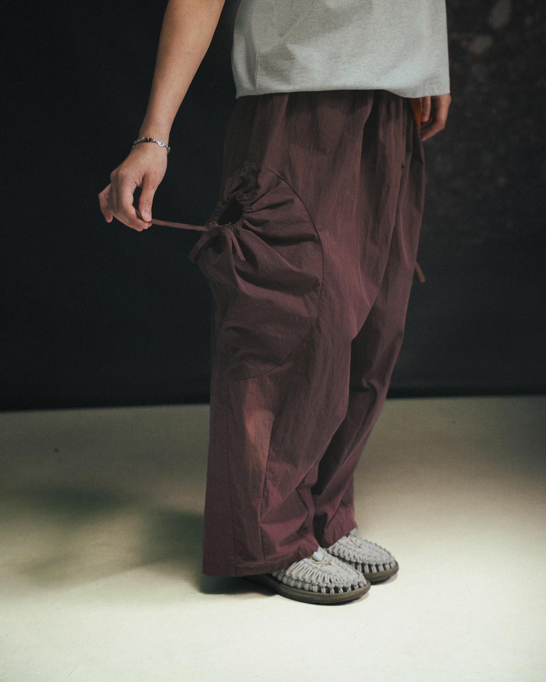 DRAWSTRING POCKET OVER PANTS